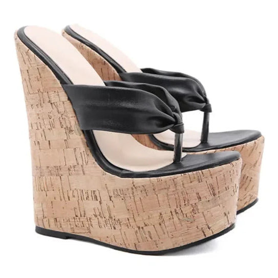 black-cork-wedge-flip-flops-pair