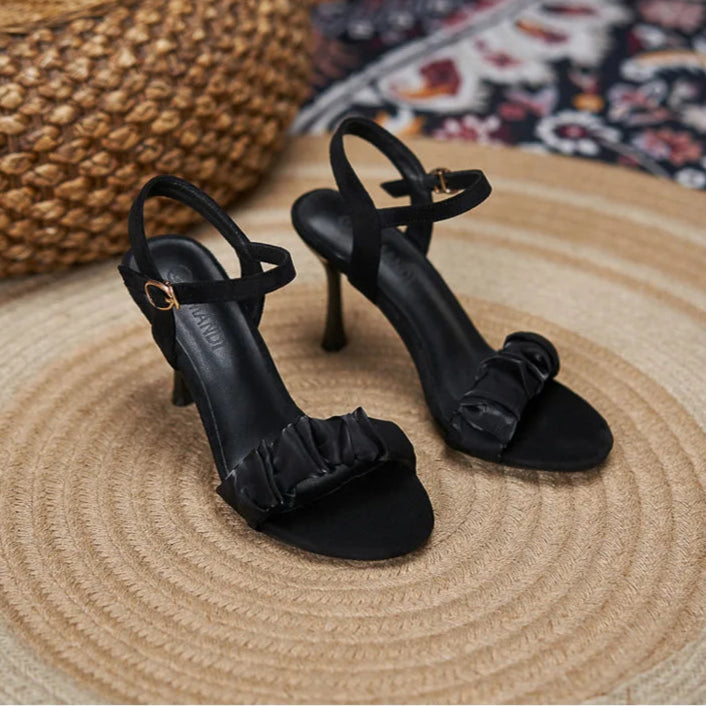 black-ruffle-heeled-sandals-pair