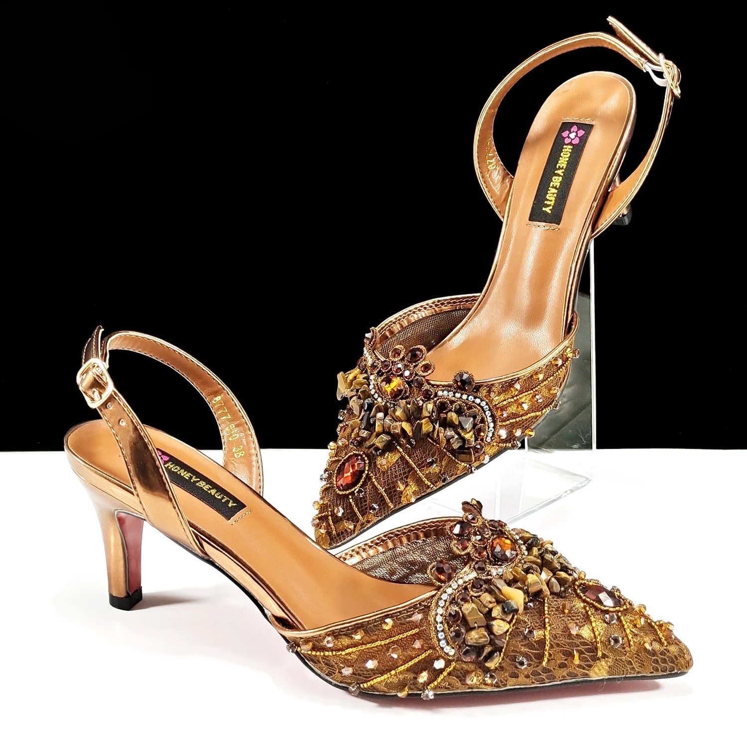 decorated-bronze-pointed-toe-heels-pair