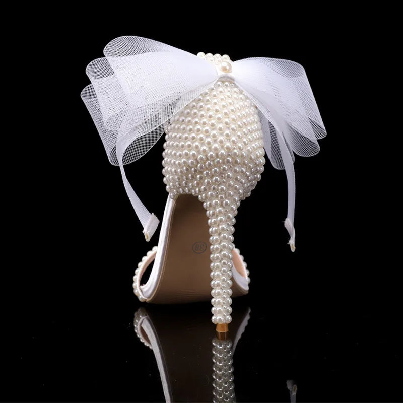 white-heels-with-bow-and-pearls-back