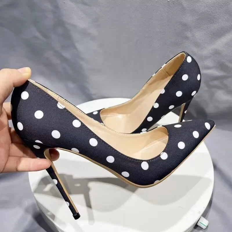 black-and-white-polka-dot-high-heels-hold