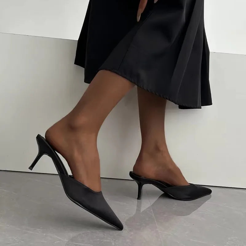 black-closed-toe-mule-heels-walk