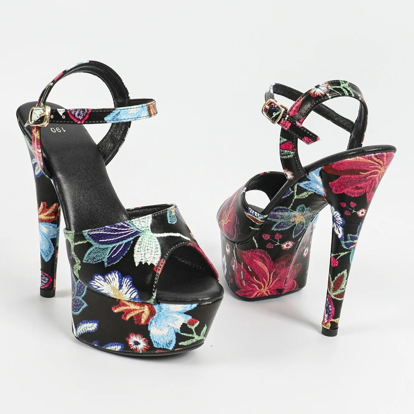 black-floral-heeled-sandals-pair