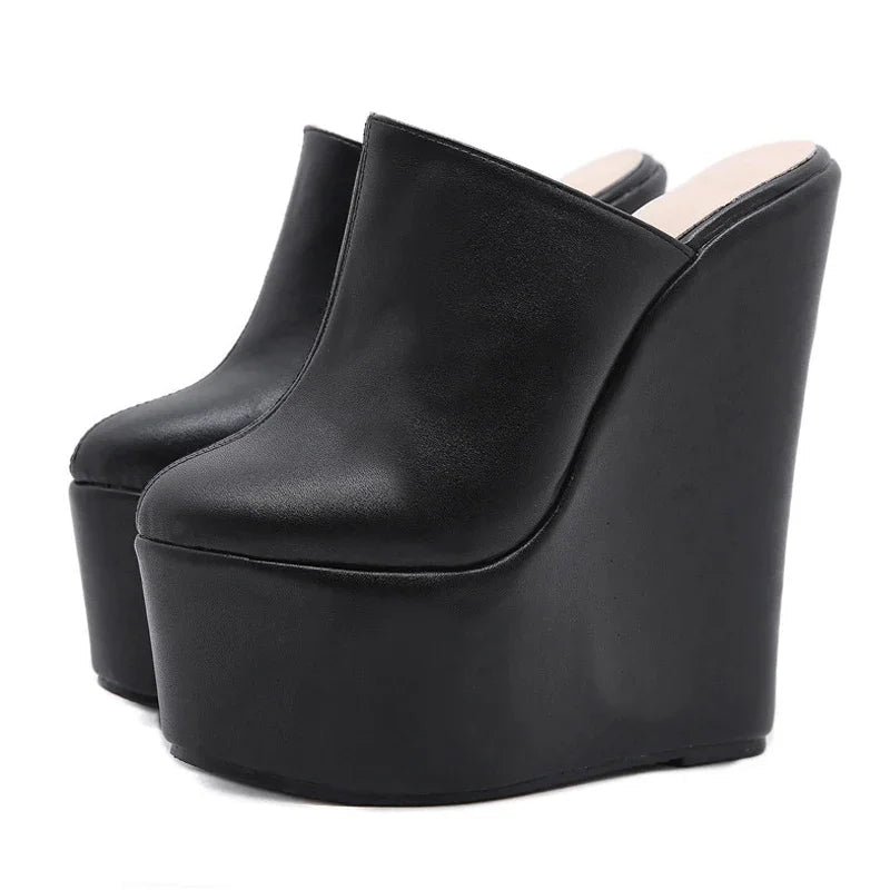 black-high-heel-wedge-clogs-pair