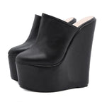 black-high-heel-wedge-clogs-pair