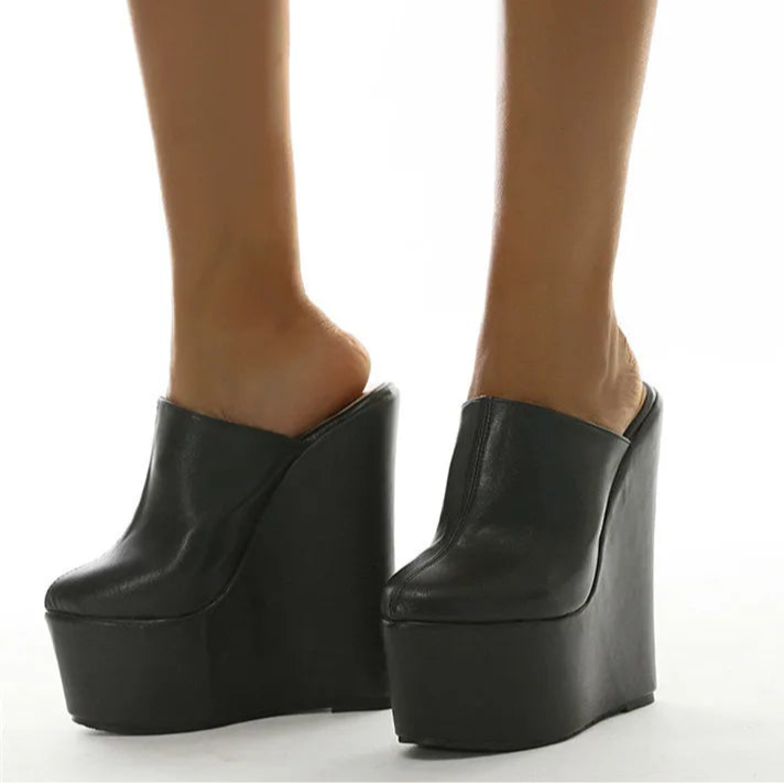 black-high-heel-wedge-clogs-standing