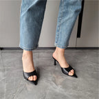 black-leather-pointed-toe-mules-front