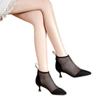 black-mesh-low-heel-booties-sitting