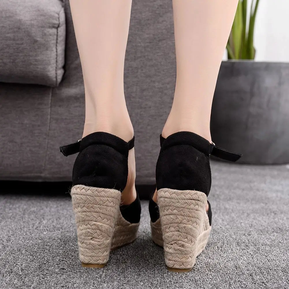 black-open-toe-espadrille-wedges-woman-back