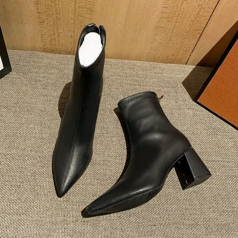 black-pointed-toe-block-heel-booties-pair