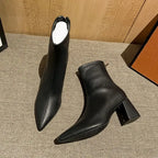 black-pointed-toe-block-heel-booties-pair