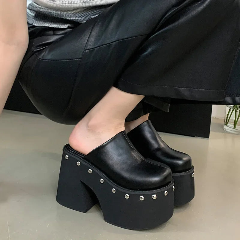 black-studded-platform-clogs-squat
