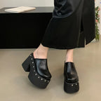black-studded-platform-clogs-standing