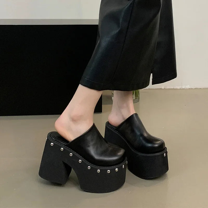 black-studded-platform-clogs-woman