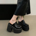 black-studded-platform-clogs-woman