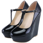 black-t-strap-wedge-heels-pair