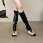 black-thong-heel-boots-pair