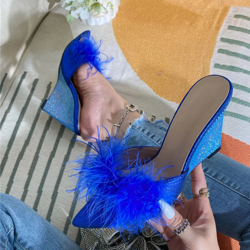 blue-fur-wedge-heels-holding