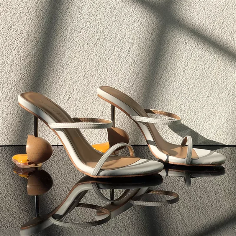 broken-egg-high-heels-white-pair
