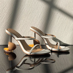 broken-egg-high-heels-white-pair
