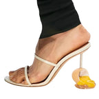 broken-egg-high-heels-white
