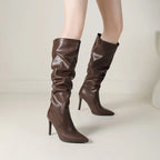 brown-high-heel-knee-high-boots-standing