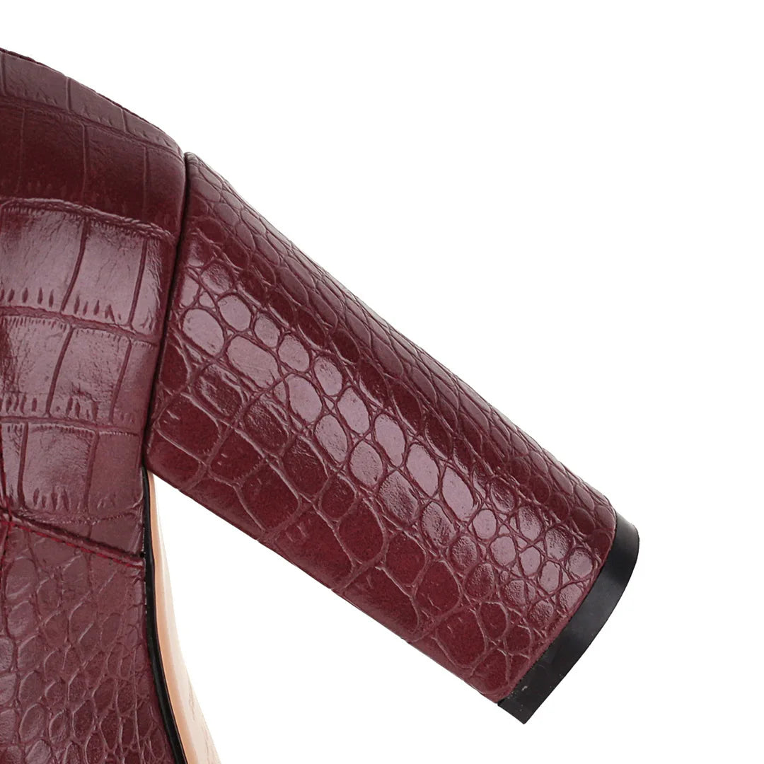 burgundy-snake-embossed-block-heel-boots-closeup-heel