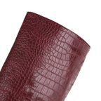 burgundy-snake-embossed-block-heel-boots-closeup