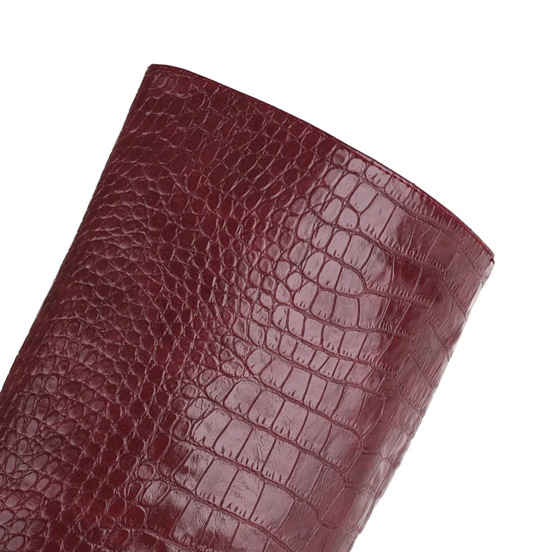 burgundy-snake-embossed-block-heel-boots-closeup