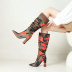camo-high-heel-boots-orange-details-model-sitting