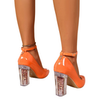 clear-and-orange-heels-back