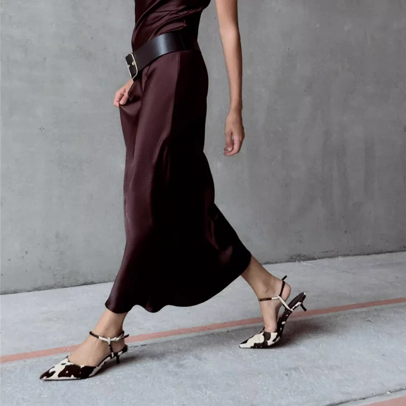 cow-print-kitten-heels-walking