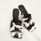 cow-print-mule-heels-pair