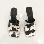 cow-print-mule-heels-top