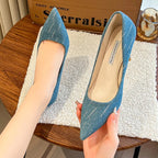denim-high-heel-shoes-blue-hand