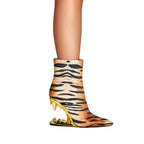 gold-tiger-teeth-heeled-booties-side