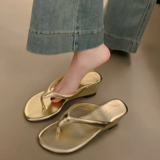 gold-wedge-flip-flops-model