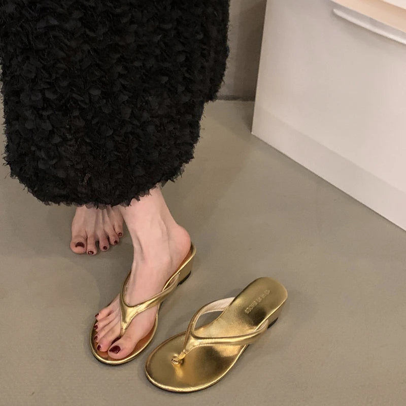 gold-wedge-flip-flops-pair