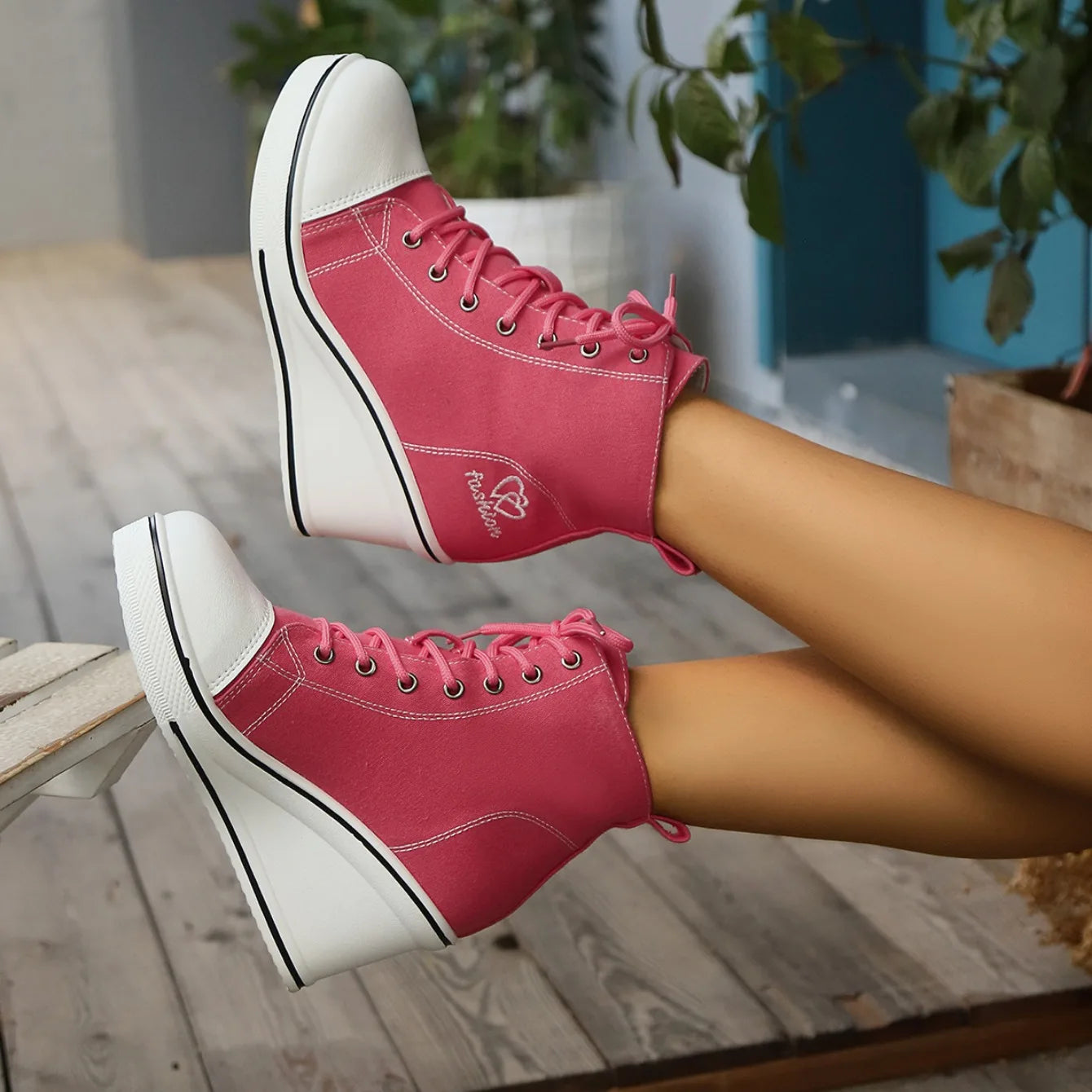 high-top-pink-wedge-sneakers-side
