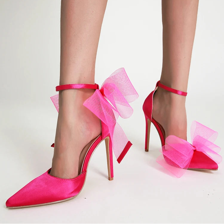 hot-pink-high-heels-with-bow-standing