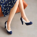 navy-and-white-high-heel-shoes-sitting
