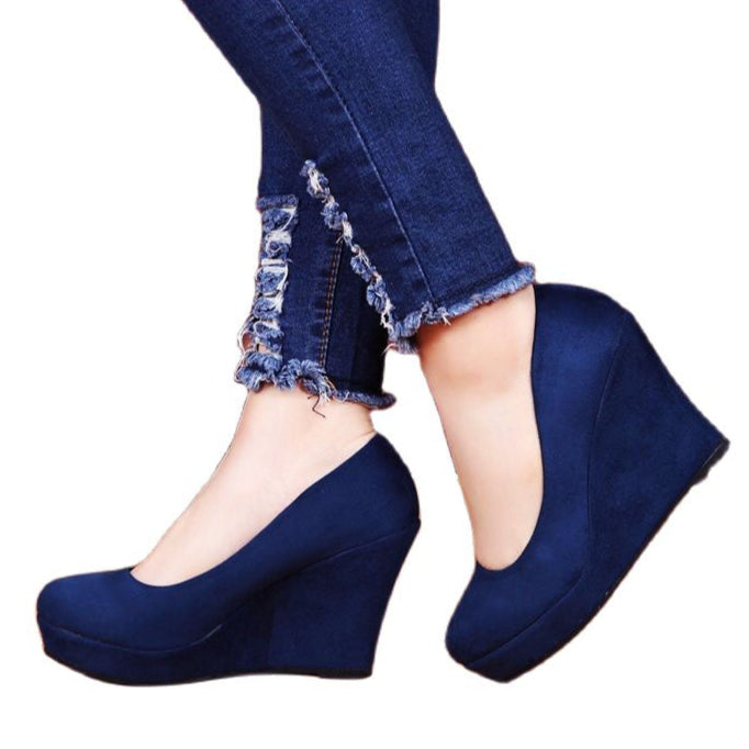 navy-blue-wedge-pumps-side