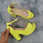 neon-yellow-heeled-sandals-pair