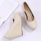 nude-patent-leather-wedges-pair-top