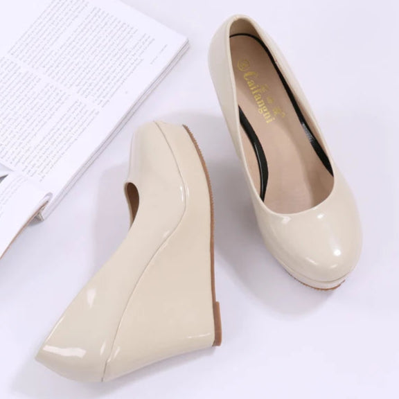 nude-patent-leather-wedges-pair-top