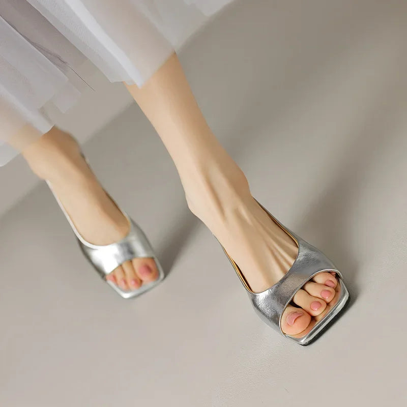 open-toe-kitten-heel-slingback-shoes-silver-walking