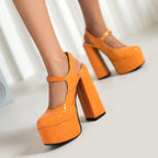 orange-crocodile-print-platform-heels-pair