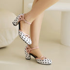 pink-black-white-polka-dot-block-heels-woman-walk
