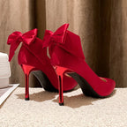 red-heels-with-bow-on-back-back