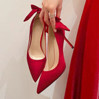 red-heels-with-bow-on-back-top